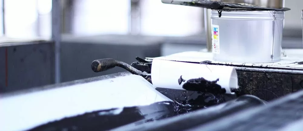Black Ink in Offset Press Ink Fountain with Roller