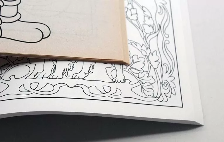 PrintNinja’s bright white, uncoated coloring book paper versus newsprint