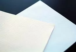 The feeling of turning pages can be more memorable with textured paper.